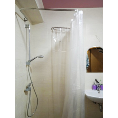 Карниз із нержавіючого металу з вигином під шторку для ванної